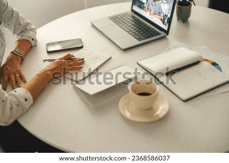 Similar – Image, Stock Photo Businesswoman making notes during workday at home