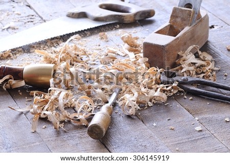 Carpenter tools on a work bench carpentry.