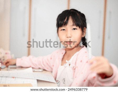 Similar – Image, Stock Photo Little girl, eight years old, sitting on the grass outdoors.