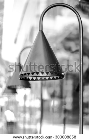 Street lamp and sky during daylight in black and white