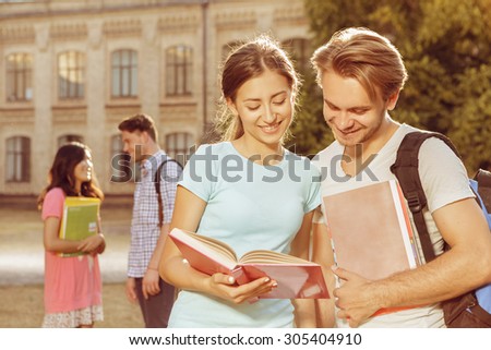 Students preparing for exams together in the park
