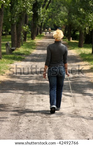 blind woman walking outdoor