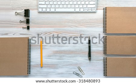 Wooden Desk with Business Items in Calm Classic Colors\
Mock Up Template of Stationary and Electronic Tools in Office Every Day Life Top View Directly from Above
