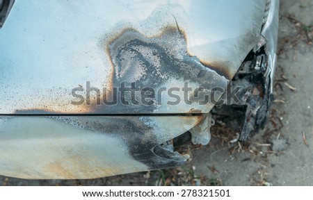burned cars in the parking lot after the fire extinguishing wiring . during combustion fused plastic parts , wires and windshield.