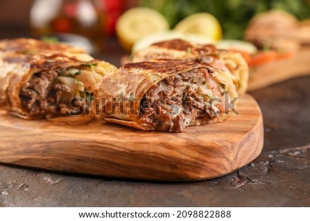 Similar – Foto Bild Döner oder Schawarma-Sandwich auf Holztisch.