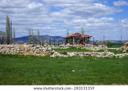 destroyed house in Turkish village