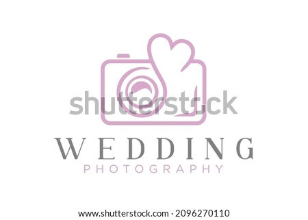 Camera and Heart symbol for Wedding photography logo