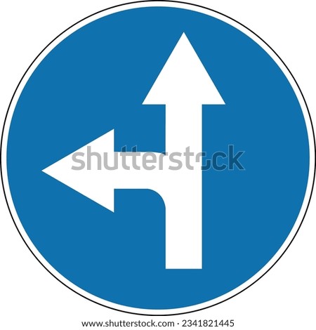 Sign move straight or left. Round blue sign. Mandatory sign. Straight ahead and turn left. Sign allows movement only straight and to left. Obey the rules of the road. Road.