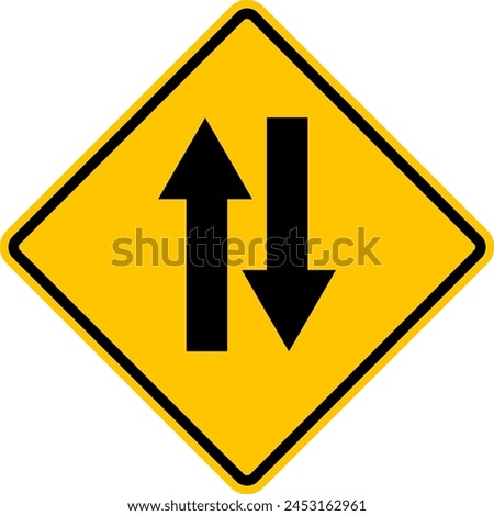 Two way traffic sign. Yellow diamond shaped warning road sign. Diamond road sign. Rhombus road sign. Be careful in front of the exit to two way traffic.