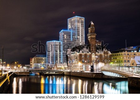 Malmo - Malmhattan- Sweden is the new center of the Town, Malmo city by night in christmas time and Winter time and the lights are reflected in the Canal. Malmo Live, Hotel, World Maritime Universit Imagine de stoc © 