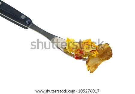 A fork with a bite of sausage and scrambled eggs with potato and peppers on a white background.
