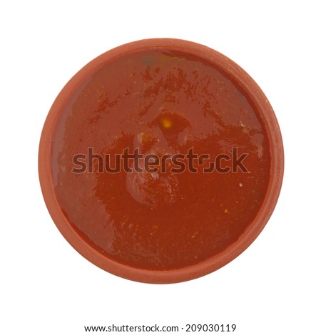 Top view of a bowl of jalapeno salsa sauce on a white background.