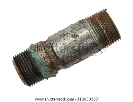 Top view of an old and leaking short pipe nipple with remains of pipe thread compound on a white background.