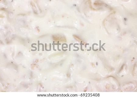 A closeup view of freshly made clam chowder.