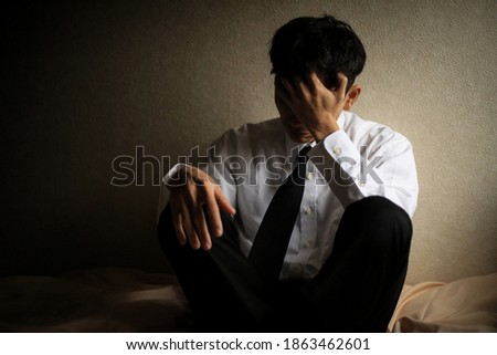 Similar – Image, Stock Photo Depressed man in suit in luxury room