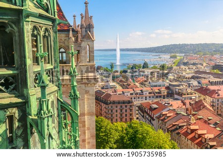 Geneva skyline, Leman Lake, Jet d'eau fountain, bay, harbor and Tower of Cathedral, French Swiss in Switzerland. View of Romanesque bell tower and spire of Saint-Pierre Cathedral. Sunny day blue sky. Foto d'archivio © 