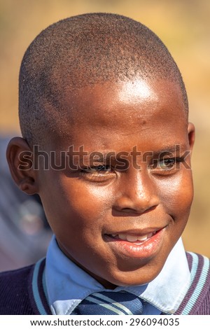 Blyde River Canyon Nature Reserve, South Africa - August 22, 2014: Portrait of a South African child smiling in school uniform.