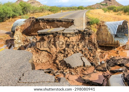 Nopolo, Baja, Baja California Sur, Mexico - August 25, 2013: Collapsed highway linking La Paz to Loreto during the tropical storm named Juliette