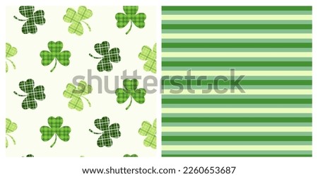 St. Patricks Day set of two seamless decorative pattern of Irish tartan clover leaves and green stripes. Hand drawn design for St. Paddy day celebration, party decoration, scrapbooking, textile. 