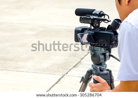 Movie making camera with cameraman