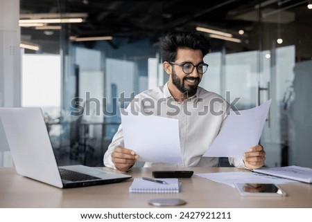 Similar – Image, Stock Photo Man working on laptop with his cat