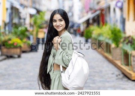 Similar – Image, Stock Photo Long haired woman standing on railways overgrown with dry grass