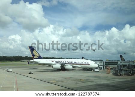 CHANGI AIRPORT, SINGAPORE - DEC 16: A Singapore Airlines Airbus A380 plane at Singapore Changi Airport on December 16, 2012. Singapore Airlines has been one of the largest buyers of Airbus A380.