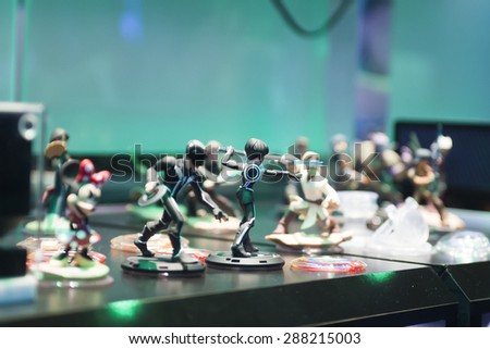 E3; The Electronic Entertainment Expo at the Los Angeles Convention Center, June 16, 2015. Los Angeles, California. Game figures from Tron on display.