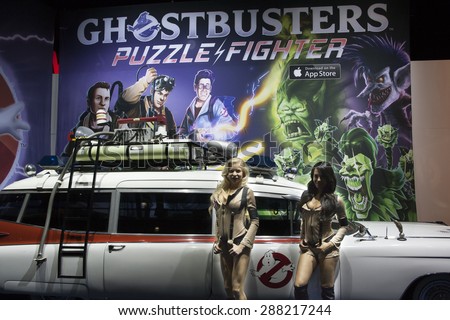 E3; The Electronic Entertainment Expo at the Los Angeles Convention Center, June 16, 2015. Los Angeles, California. Ghostbusters game and their booth babes.