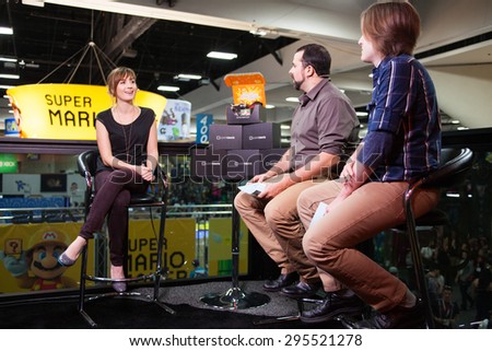 July 10, 2015: San Diego Comic Con, the annual pop culture and fan convention in San Diego, California. Battlebots host Alison Haislip being interviewed at the Loot Crate and GamesRadar booth.