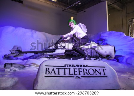 July 10, 2015: San Diego Comic Con, the annual pop culture and fandom convention in San Diego, California. A cosplayer poses for a photo at the Star Wars Battlefront photo booth at Nerd HQ.