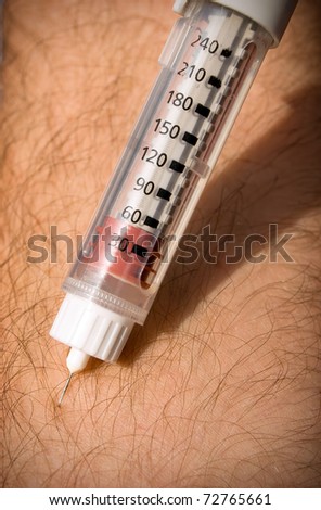 Patient injecting insulin