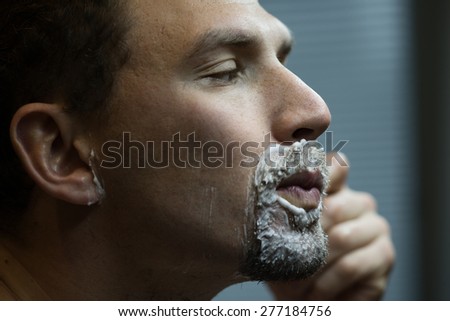 Shaving man