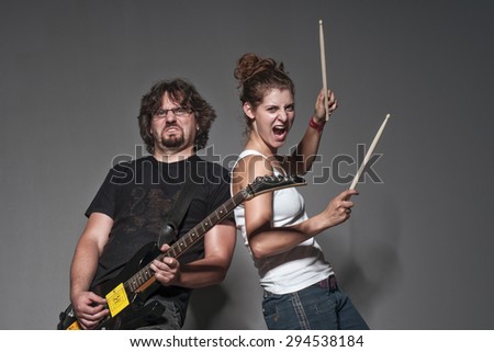 Friends playing on musical instruments
