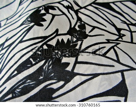 Vintage head scarf or large handkerchief with bold black and white tropical design. Detailed image of real silk scarf.