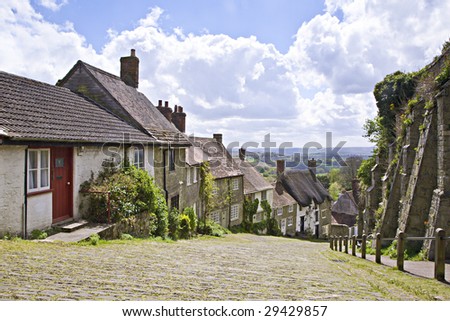 A quaint rural village street in England, Gold Hill in West Sussex. This iconic street is famous for its use in a 1970\'s TV advert.