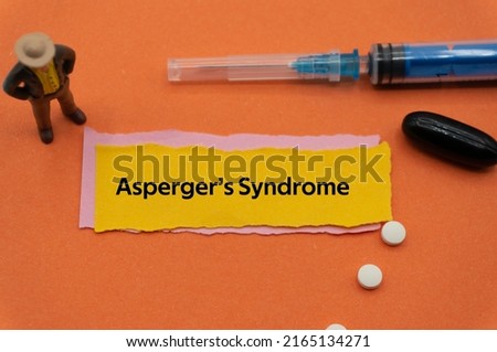 Asperger's Syndrome.The word is written on a slip of colored paper. health terms, health care words, medical terminology. wellness Buzzwords. disease acronyms. Stock fotó © 