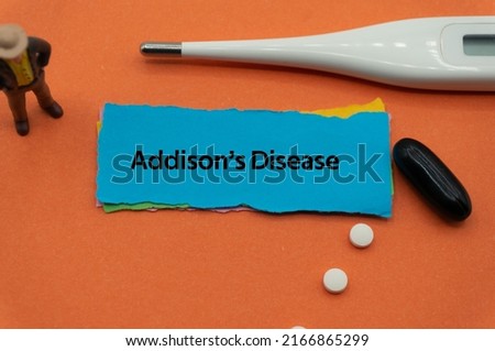 Addison's Disease.The word is written on a slip of colored paper. health terms, health care words, medical terminology. wellness Buzzwords. disease acronyms. Stock fotó © 