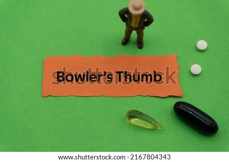 Bowler's Thumb.The word is written on a slip of colored paper. health terms, health care words, medical terminology. wellness Buzzwords. disease acronyms. Stock fotó © 