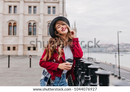 Similar – Image, Stock Photo A girl in a red Christmas hat is making gingerbread dough in the kitchen. Christmas tradition, Christmas atmosphere, preparation for the holiday