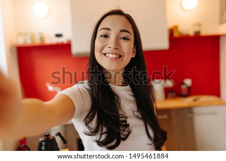 Similar – Image, Stock Photo Young woman taking selfies outdoors.