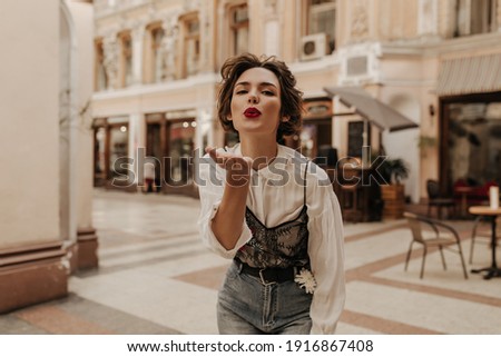 Image, Stock Photo Charming woman in lace bra in studio