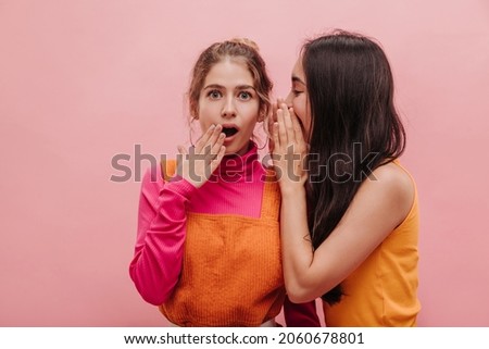 Similar – Image, Stock Photo Surprised woman talking by phone, great news, open mouth, wow. Young lady on pink background. Having smartphone call.