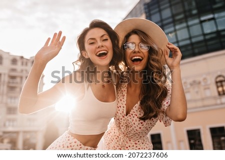 Similar – Image, Stock Photo Portrait of Two Pretty Young Women Hugging and Smiling Outdoors