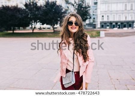 Similar – Image, Stock Photo Stylish woman with pink roses standing in studio