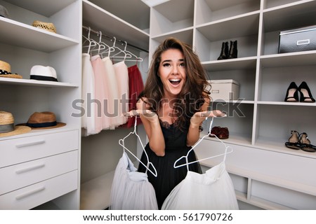 Similar – Image, Stock Photo Young woman in dressing room of swimming pool