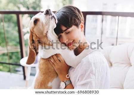 Similar – Image, Stock Photo Woman with cute dog on beach