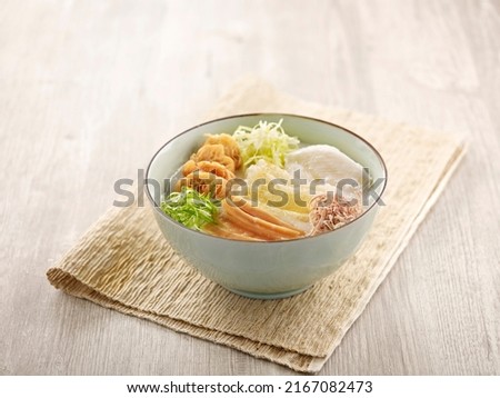 Ting Zai Style Congee served in a dish isolated on mat side view on grey background Stockfoto © 