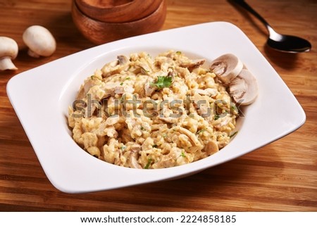 Similar – Image, Stock Photo Served chicken with mushrooms corn and greenery