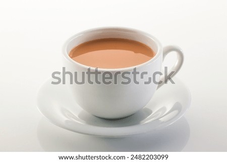 Similar – Image, Stock Photo White tea cup and saucer with a pattern for drink on white background. Ceramic coffee cup or mug close up. Mockup classic porcelain utensils. copy space